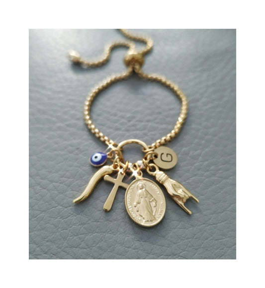 gold good luck charms bracelet with Italain horn, italian hand, evil eye madonna Virgin Mary, cross